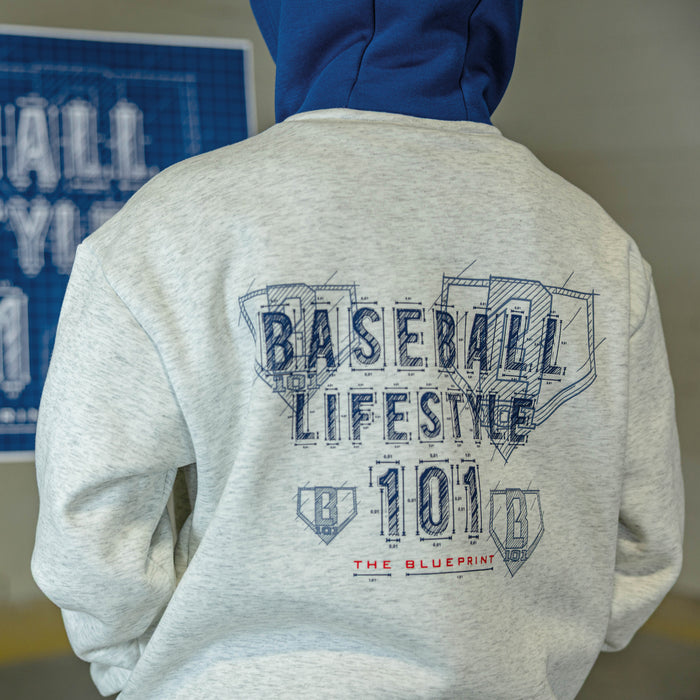 Youth model wearing gray Blueprint BL Heather Gray youth hoodie