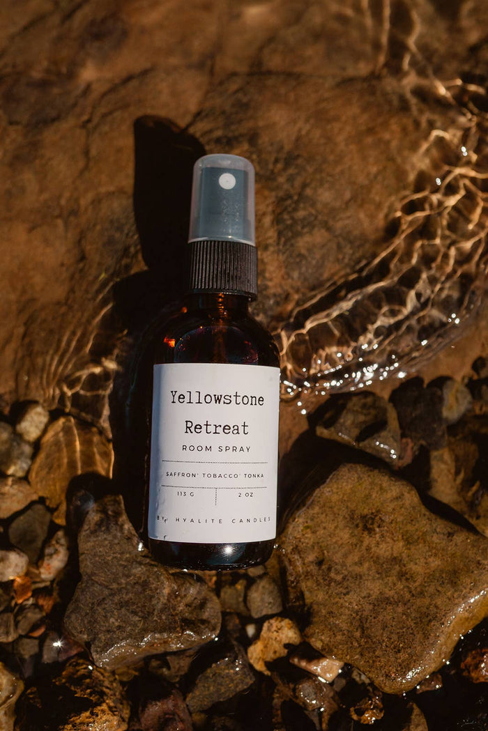 Hyalite & Co Montana Homestead room spray bottle with a rustic label, designed to freshen indoor spaces with natural scents.