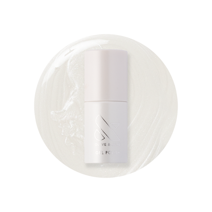 Atlas - Gel polish bottle on pearly white gel polish background for a clean and elegant manicure by Olive and June