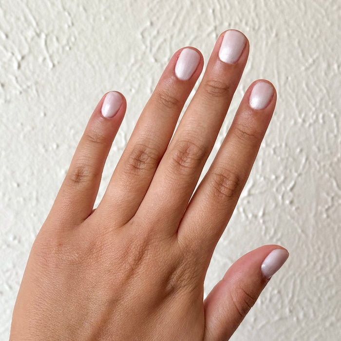 Atlas - Gel on natural nails with a smooth, pearly white finish for a classic manicure by Olive and June