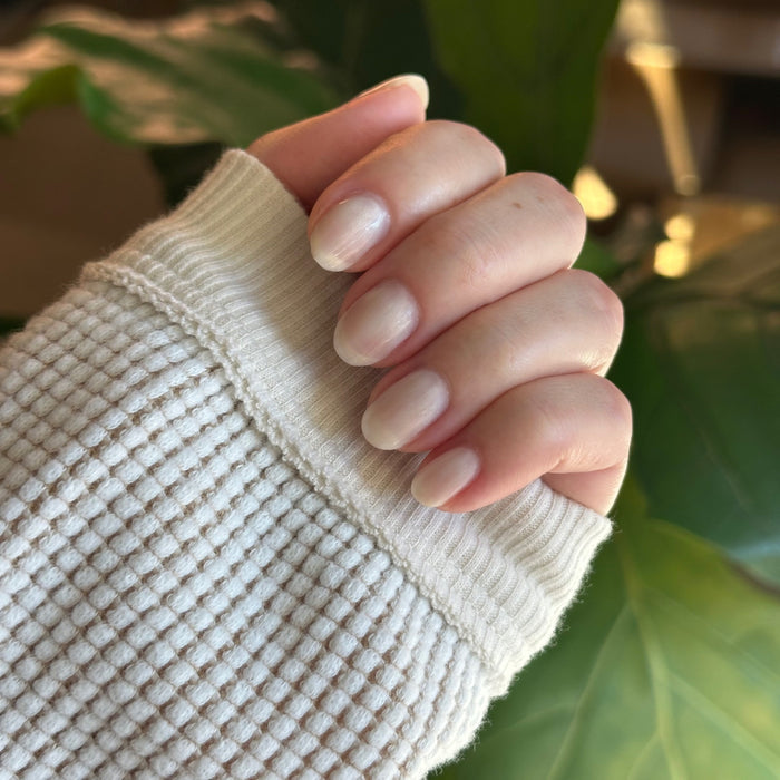 Atlas - Gel on natural nails with a smooth pearly white finish for an elegant mani by Olive and June