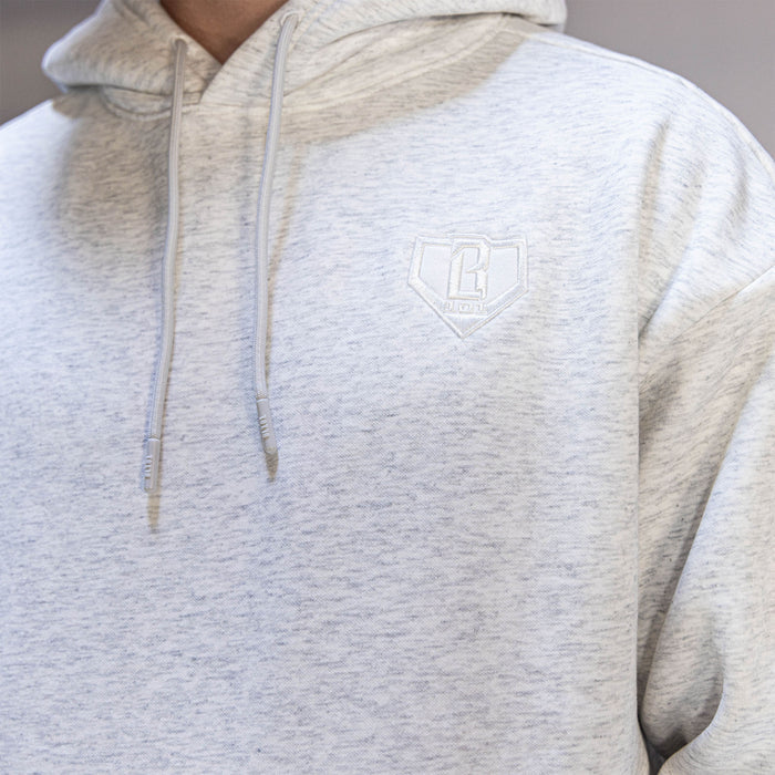Adult model wearing gray Baseline Heather Gray hoodie