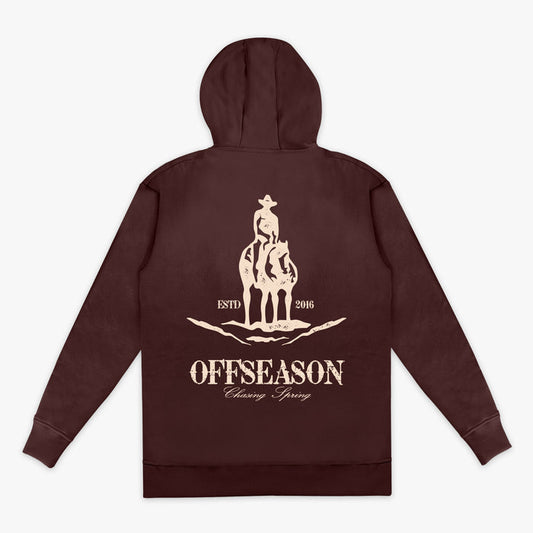 Brown hoodie with a graphic of a person on a horse and 'Offseason' text on the back, against a white background.