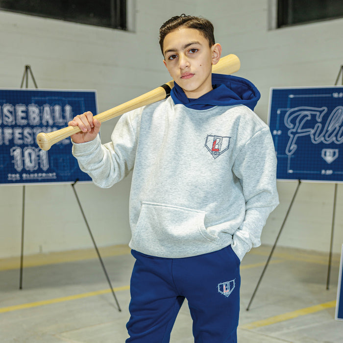 Youth model wearing gray Blueprint BL Heather Gray youth hoodie