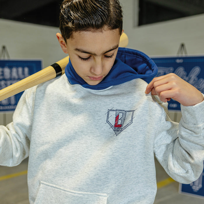 Youth model wearing gray Blueprint BL Heather Gray youth hoodie