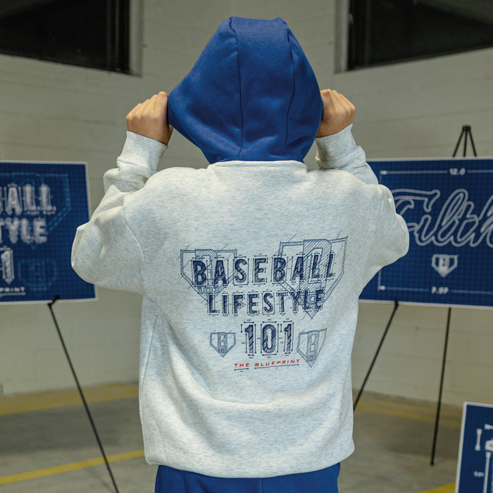 Youth model wearing gray Blueprint BL Heather Gray youth hoodie