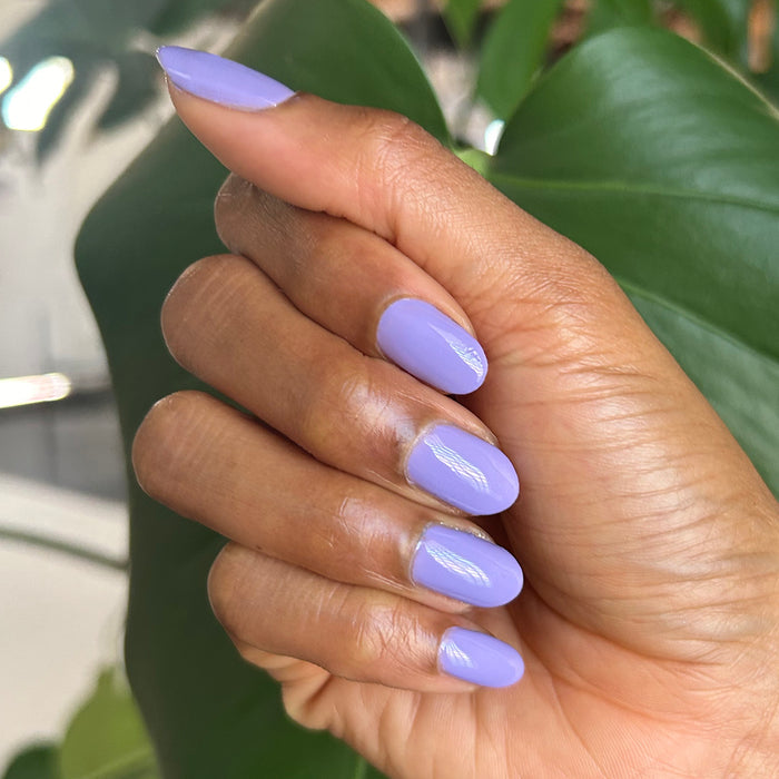Bold & Unshaken - Gel shown on manicured nails in a smooth purple shade for a long-lasting gel polish mani by Olive and June