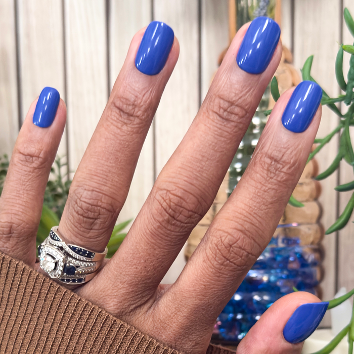 Breezy | Short | Squoval - Tab Press-On nails in vibrant cobalt blue for a quick at-home mani with smooth finish
