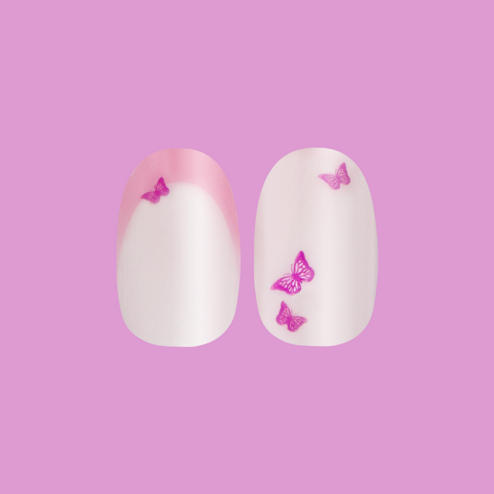 Butterfly Mixed French - Press-On | Medium | Oval with neutral base, pink tips, and delicate purple butterfly accents for easy manicure
