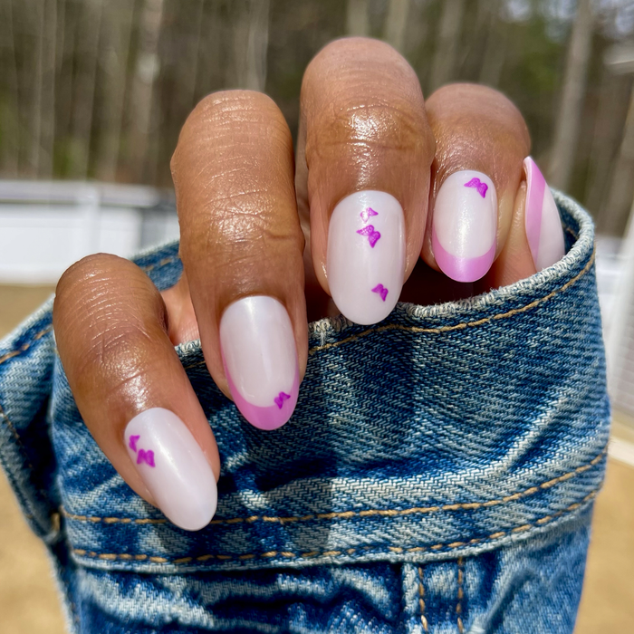 Butterfly Mixed French - Press-On | Medium | Oval with pearl base, pink tips, and small purple butterfly details for easy at-home manicure