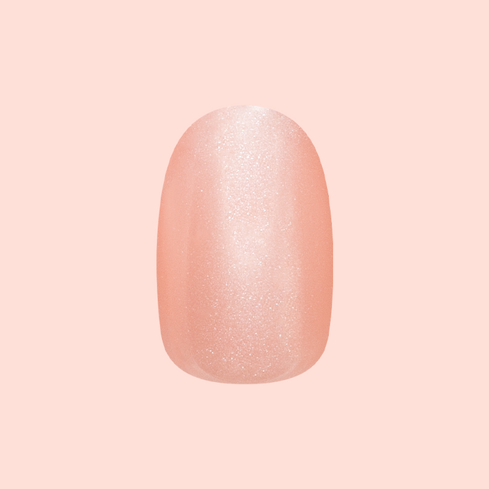 Candy Floss | Extra Short | Round - Tab Press-On nail with soft shimmery pink polish for easy at-home mani use