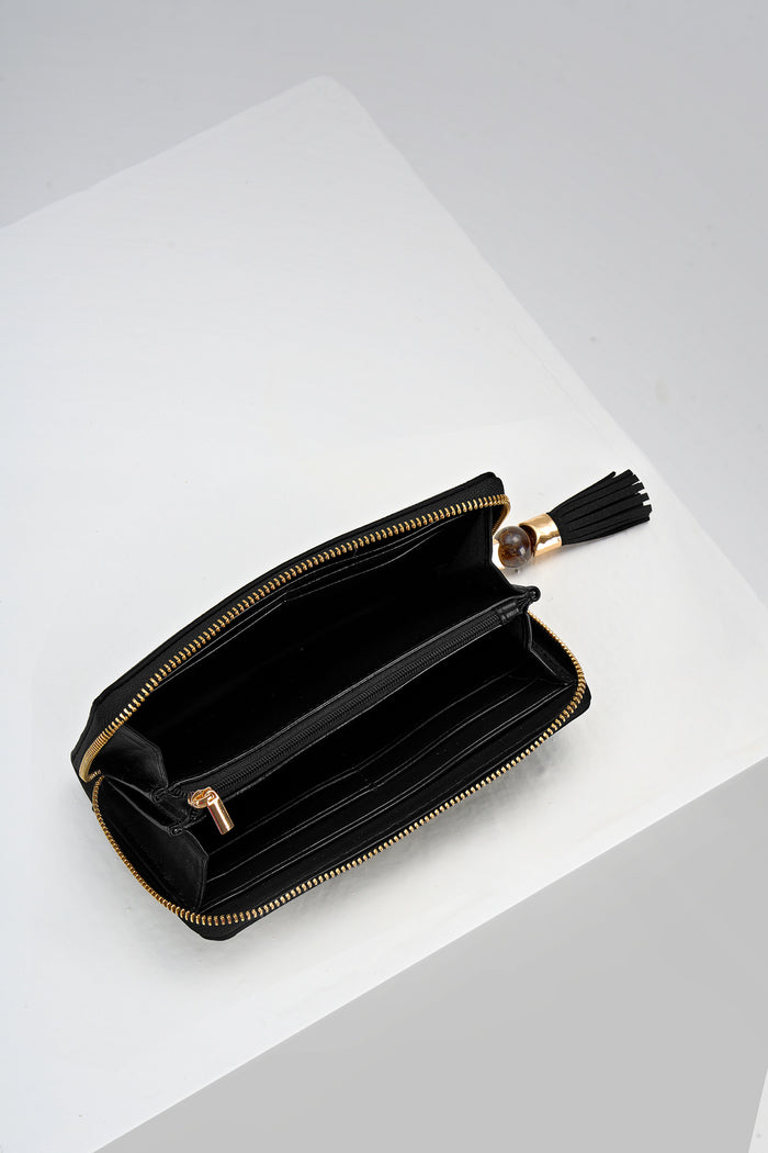 Inside of Capriana Black faux leather Large Purse with the zip open showing the inside card slots and coin holder zip pocket