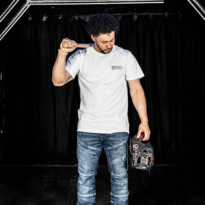 Adult model wearing white graphic tee with "Chicago White Sox Drip" design