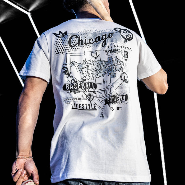 Adult model wearing white graphic tee with "Chicago White Sox Drip" design