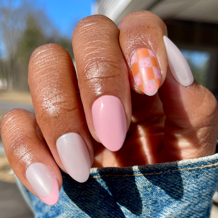 Chrome Flower Mixed Pack - Press-On | Medium | Almond with pastel pink, white, and floral checkered designs on natural hand