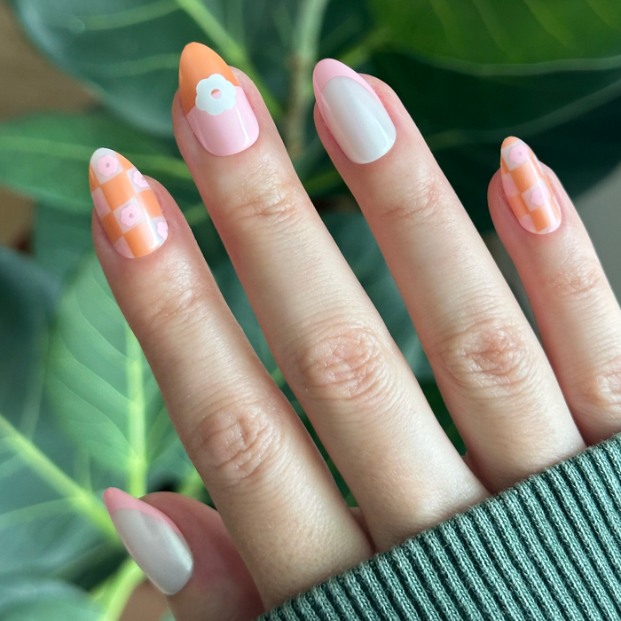 Chrome Flower Mixed Pack - Press-On | Medium | Almond with peach and pink florals and checkered designs on natural hand