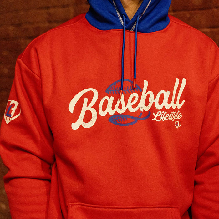 Close up of red Baseball Lifestyle hoodie chest graphic with blue baseball lace detail and BL101 sleeve logo
