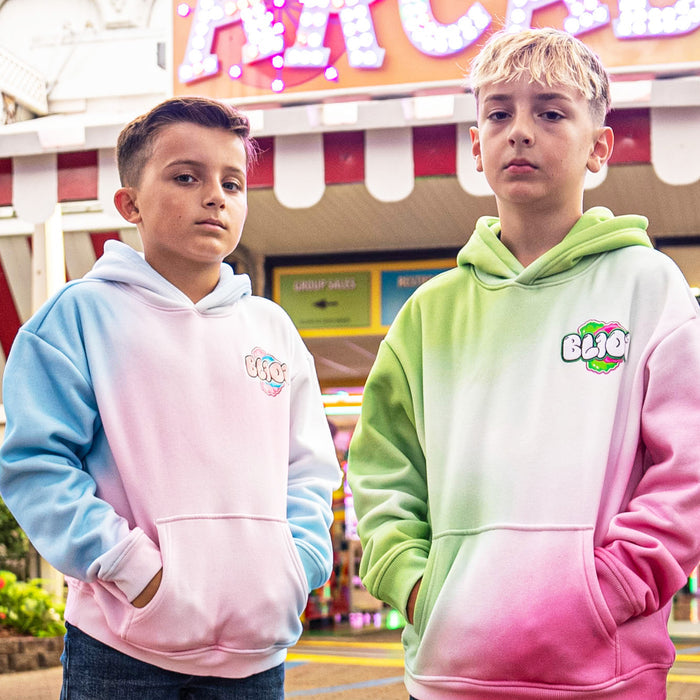 Two children wearing gradient hoodies with a 'BL101' logo