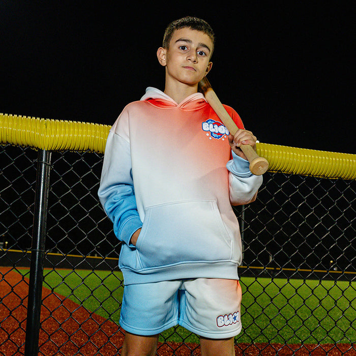 Youth model wearing red, white & blue Cotton Candy USA youth hoodie