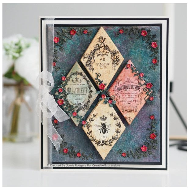 amie Rodgers Canvas Collection Diamond die set to create easy to build canvas and frame effects on your projects.  They are easy to construct and incredibly versatile, simply fold on the score lines and glue to create focal points for your projects. Includes 4 dies. Size: 4.6" x 3.4". Available at embellishaway.ca in Bowmanville Ontario Canada. Card Example