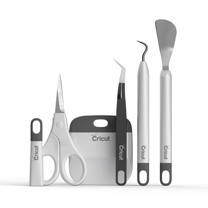 Cricut - Basic Tools Set - Gray. Craft in style with our Basic Tool Set in fresh, complementary hues. This 5-piece set gets you started with the basic tools you need for a Cricut® crafting session. You'll be equipped to precisely and expertly handle most DIY projects, from vinyl for decals to iron-on decor projects, to cardstock masterpieces - and that's just the beginning. It's an essential companion for all Cricut smart cutting machines. Available at Embellish Away located in Bowmanville Ontar