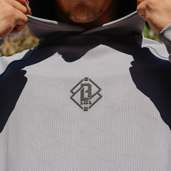 Adult model wearing gray Diamond Tech Jacquard hoodie