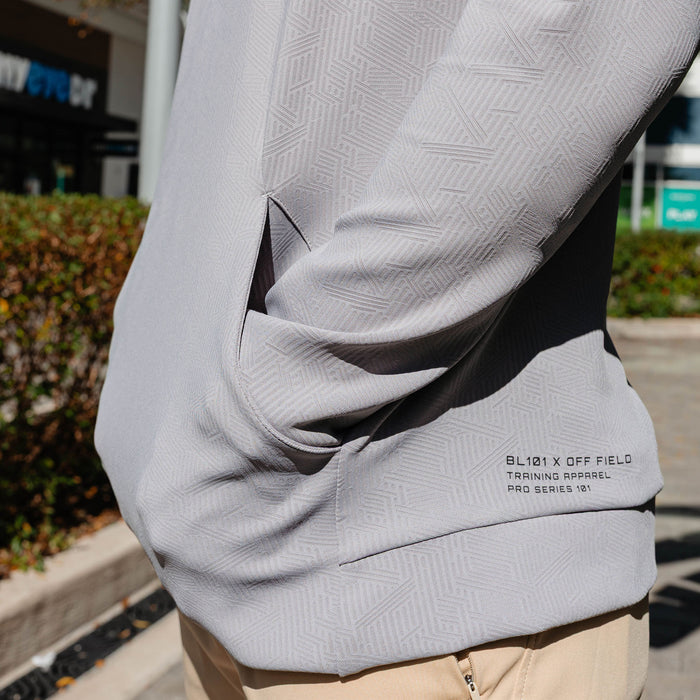 Adult model wearing gray Diamond Tech Jacquard hoodie