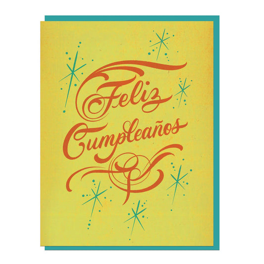 Greeting card with Feliz Cumpleanos script and teal starbursts