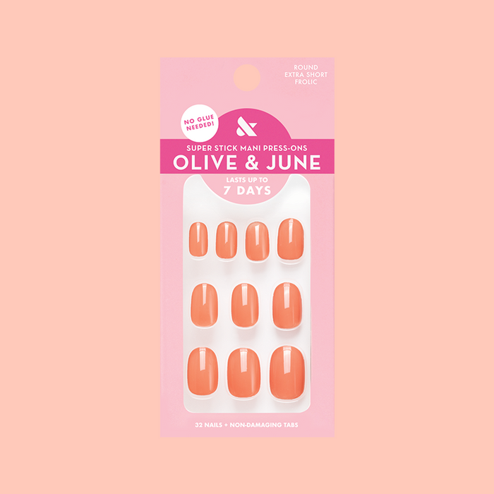 Frolic | Extra Short | Round - Tab Press-On nails in bright orangey coral shade for easy at-home mani application