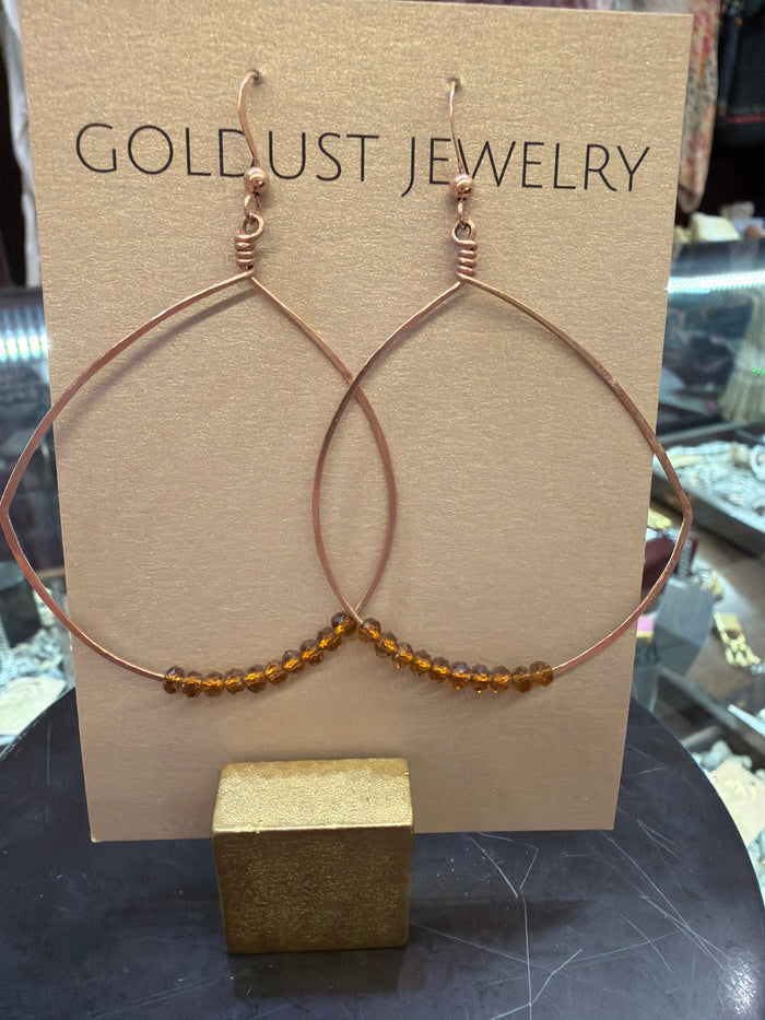 Goldust Jewelry GD Crystal Earrings with sparkling crystal stones and gold-tone setting, stylish and elegant earring design.