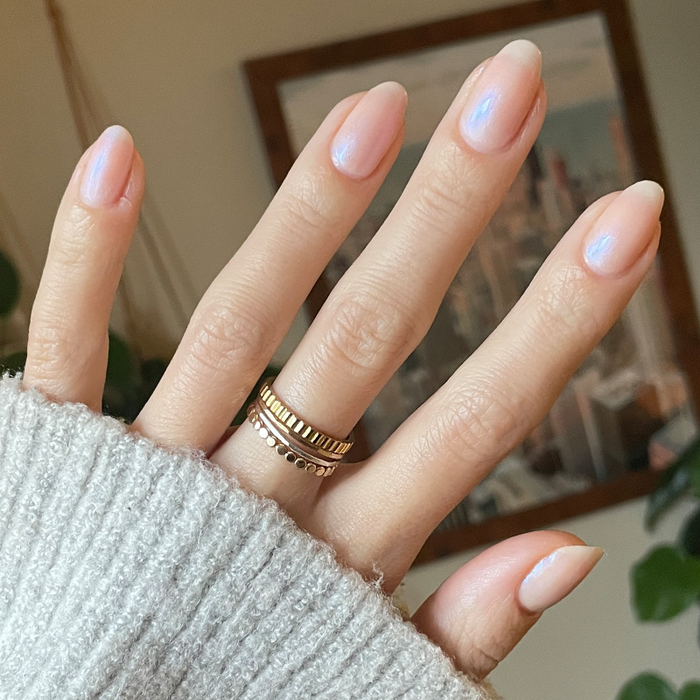 Glazed Donut Set manicure showing natural nails with soft pink iridescent polish and glossy finish by Olive and June