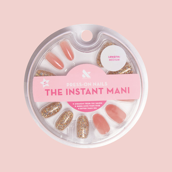 Glitter Accent - Press-On | Medium | Oval false nails with neutral jelly finish and gold glitter accent for an easy at-home mani