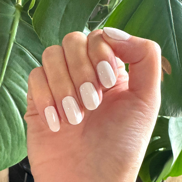 HD - Gel showing smooth, crisp white gel polish on natural nails for a fresh, long-lasting at-home manicure look