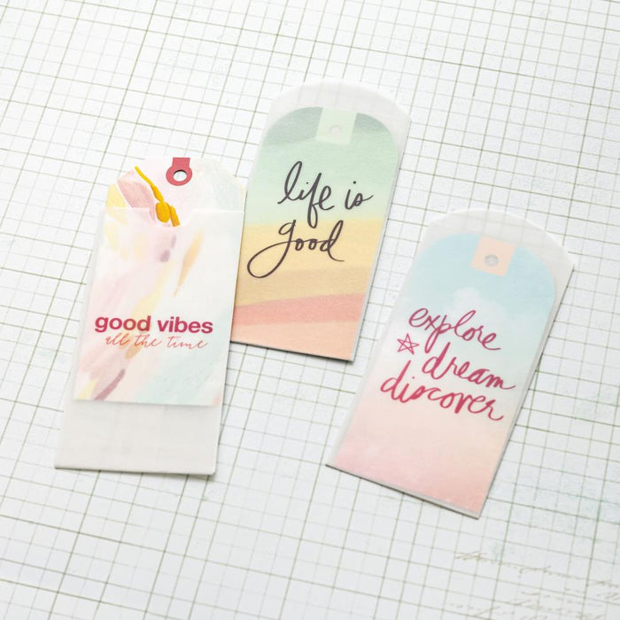Heidi Swapp - Sun Chaser - Tag Set - 12/Pkg. Available at Embellish Away located in Bowmanville Ontario Canada.