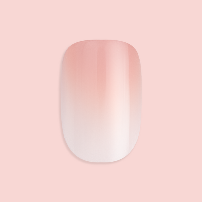 HZ Syrup Gradient - Press-On | Extra Short | Squoval showing single extra short squoval false nail with rosey beige gradient manicure