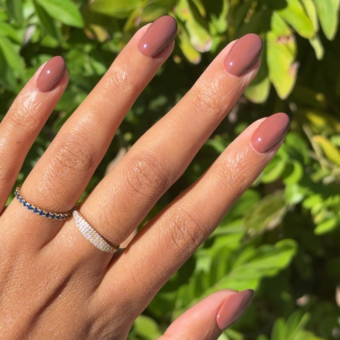 JJ - Gel on natural nails in a soft cinnamon brown shade for a smooth, long-lasting mani by Olive and June