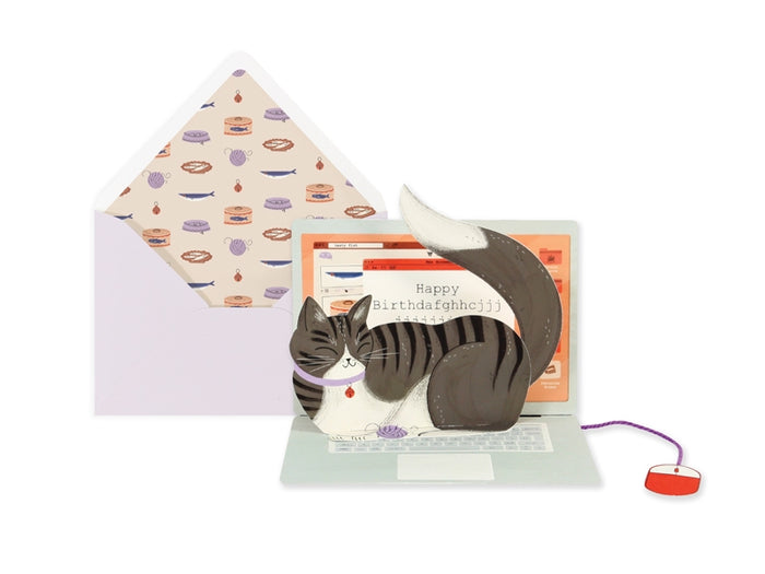 Birthday pop-up card featuring layered black cat cutout and a patterned envelope with icons