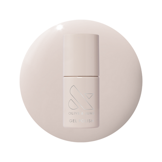Bottle of LHG - Gel polish in soft grey neutral with a subtle pink undertone on matching light background