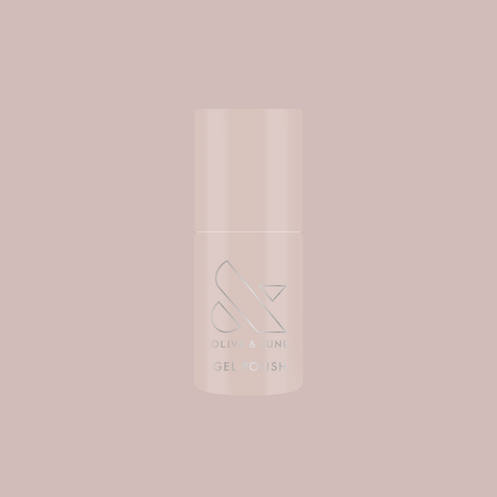 Bottle of LHG - Gel polish in muted grey neutral with a subtle pink undertone on soft matching background