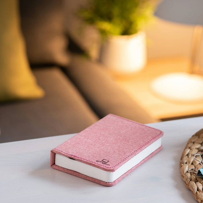 Gingko Design linen fabric smart book light lamp with soft LED illumination, featuring a sleek, modern design and fabric cover.