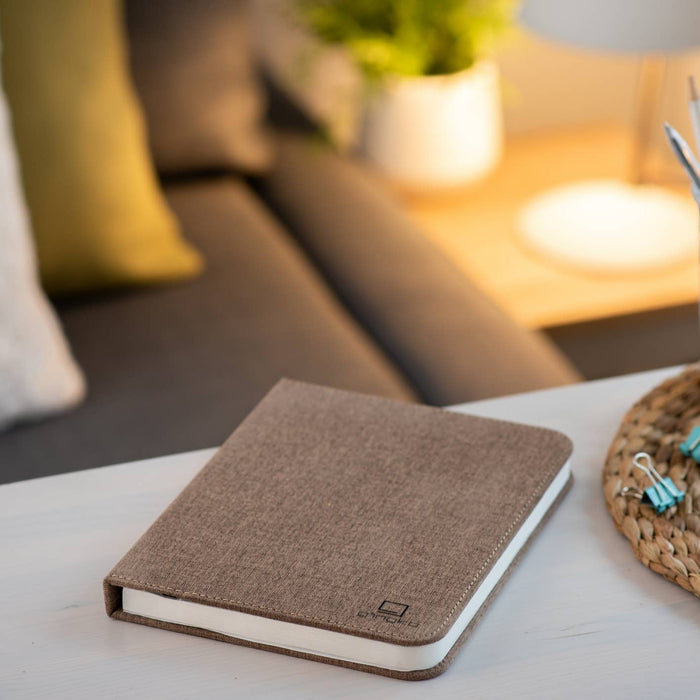 Gingko Design linen fabric smart book light with a sleek lamp design, perfect for reading and ambient lighting.
