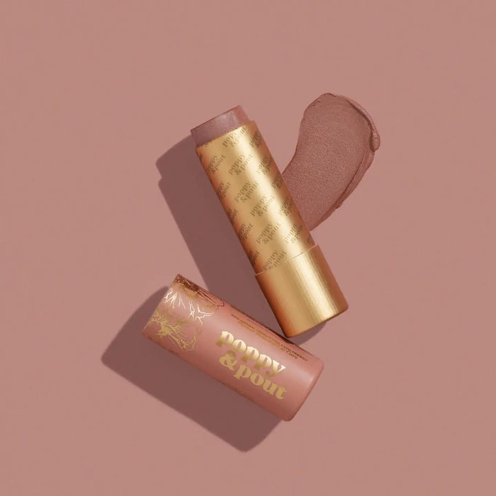 Lip tint gold tube with nude applicator end and peach-pink tint tube