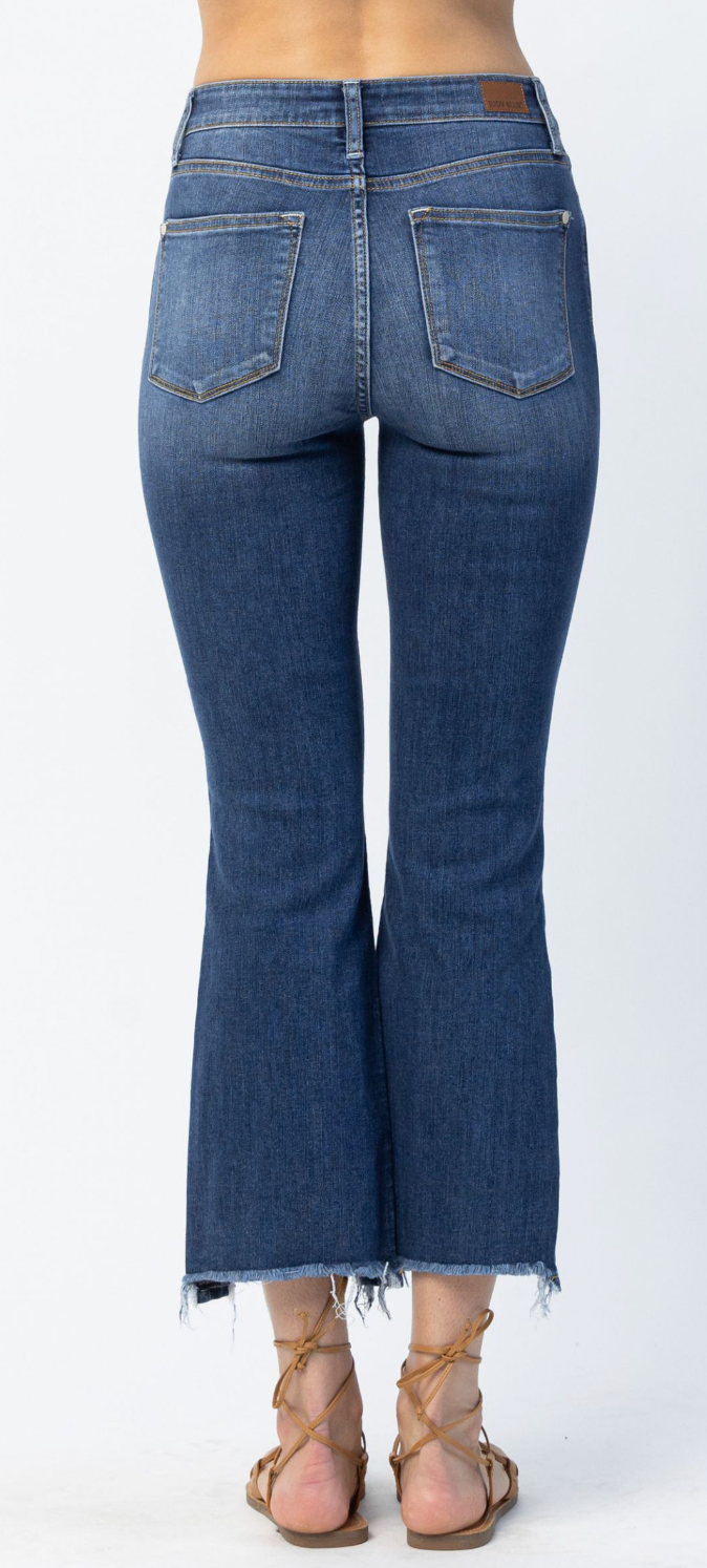 Midrise Distressed Boot Cut w/Step Hem Jeans