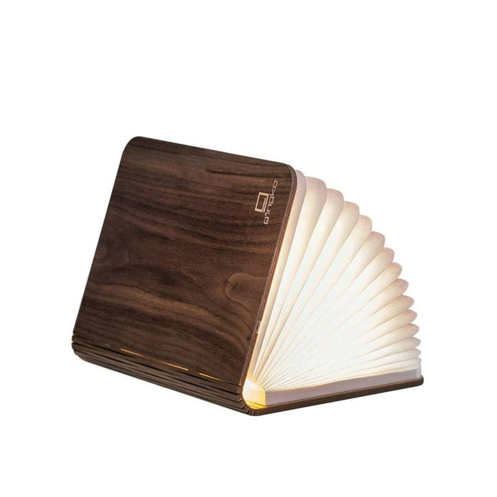 Natural wood smart book light by Gingko Design, featuring a sleek, minimalist lamp with a wooden finish and adjustable reading light.