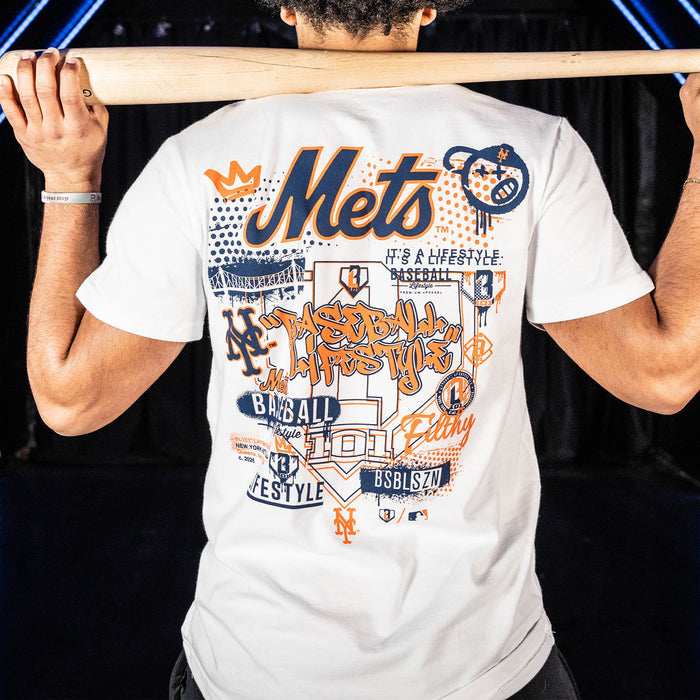 Adult model wearing white graphic tee with "New York Mets Drip" design