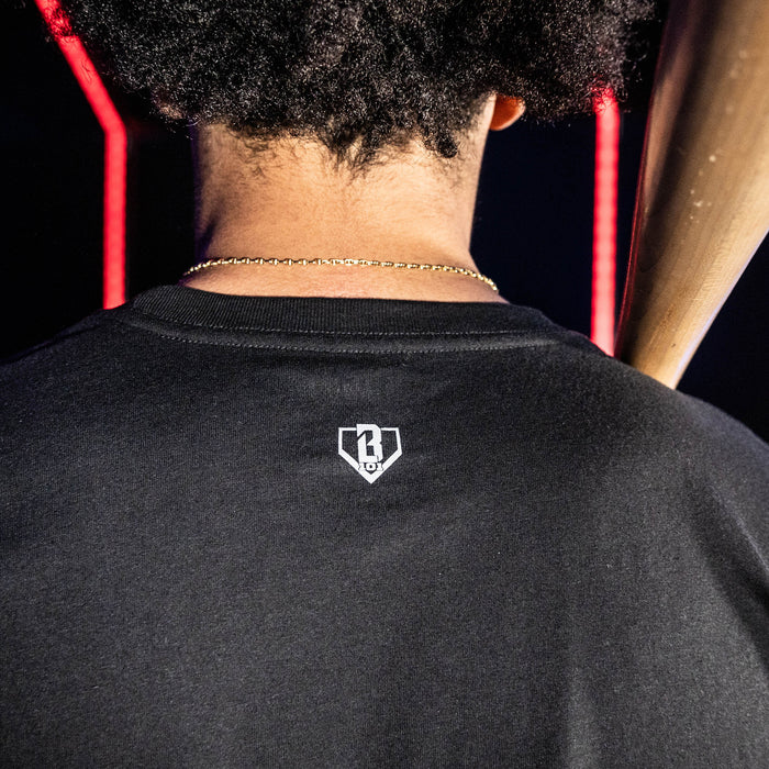 Adult model wearing black graphic tee with "New York Yankees Upside Down" design