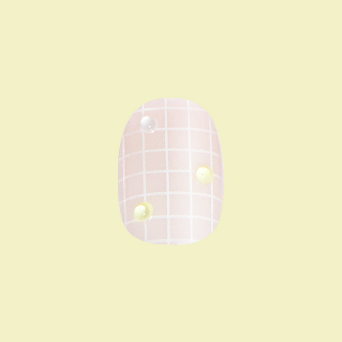 Nothing But Net - Press-On | Extra Short | Round with neutral grid base and subtle tennis ball accents for easy at-home manicure
