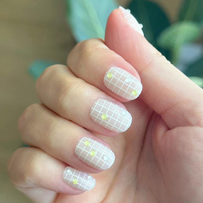 Nothing But Net - Press-On | Extra Short | Round with neutral grid pattern and subtle green tennis ball accents for easy at-home manicure