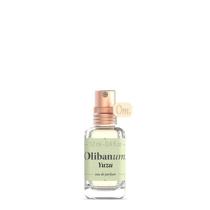 Olibanum Yuzu eau de parfum bottle with rose-gold spray cap, 0.4 fl oz