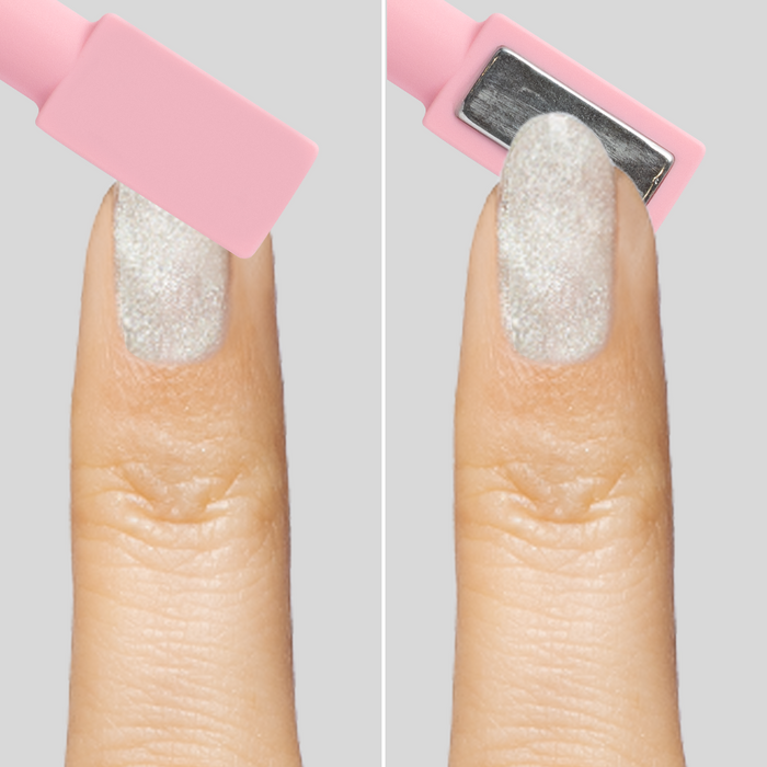 Close-up of finger showing Platinum Velvet - Gel sheer silver shimmer polish with magnetic tool creating textured sparkle effect